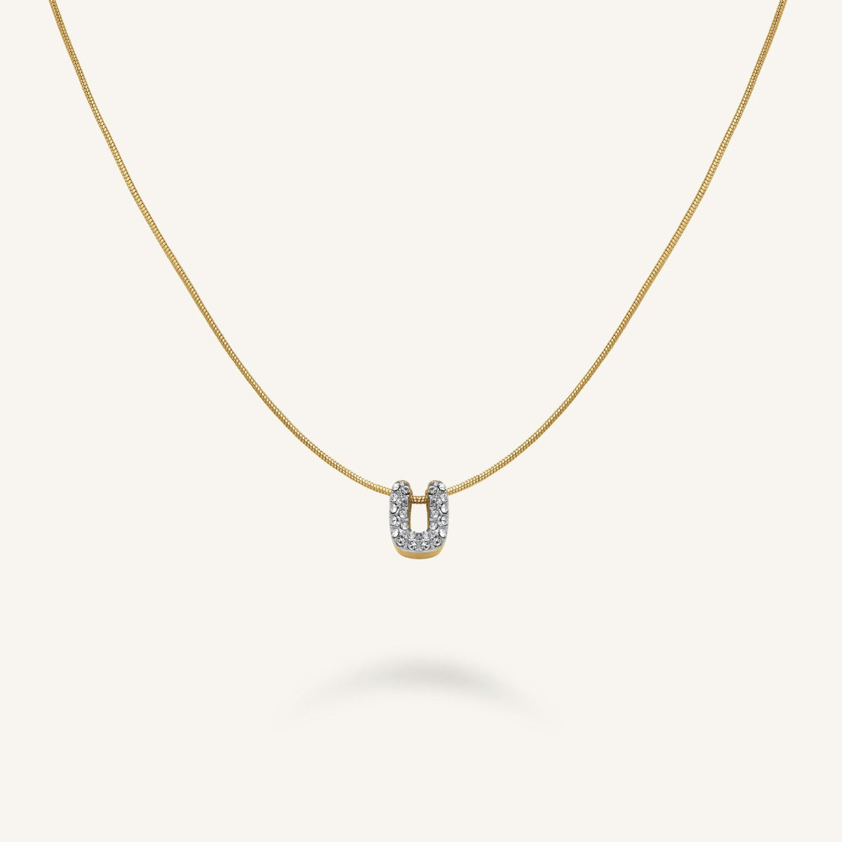 Collar Letra U con cristales leftcolumn